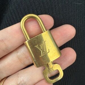 Louis Vuitton Brass-Toned Padlock and Key